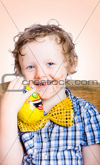 Smiling happy kid holding easter egg gift