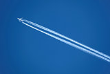 Airplane with contrail
