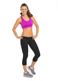 Full length portrait of happy fitness young woman