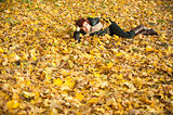 young woman portrait in autumn park