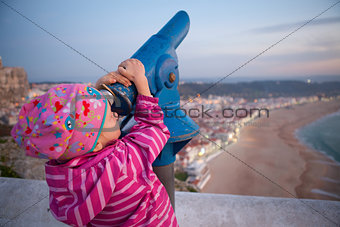 Girl looking at Nazare