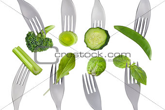 healthy raw green food selection on white