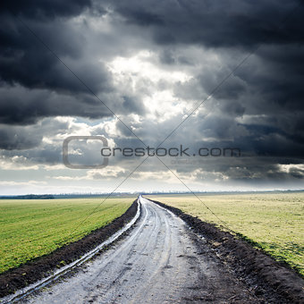 dirty road to cloudy horizon
