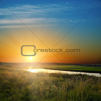 golden sunset over river