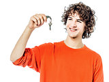 young man holding keys portrait