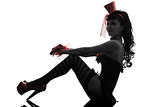 woman stripper showgirl sitting full length silhouette