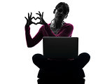 woman heart gesture computing laptop computer silhouette