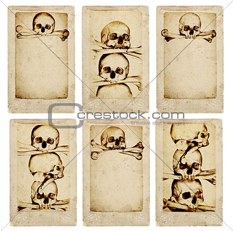 Grunge cards with human skulls and bones