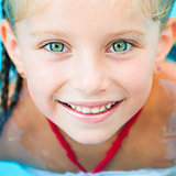 pretty little girl in swimming...