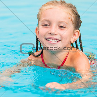 pretty little girl in swimming...