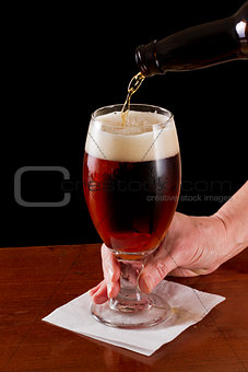 pouring a beer