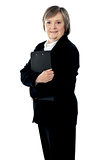 Corporate lady posing with documents