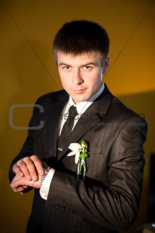 groom with watch