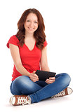 Young woman playing games on tablet