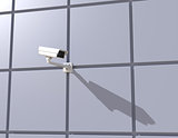 Security Camera Mounted on the Facade of the Building