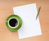 Blank paper with pen and coffee cup