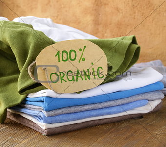 stack of multicolored clothing with organic label