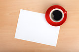 Blank paper and red coffee cup
