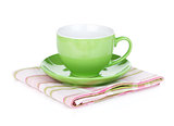 Coffee cup on kitchen towel