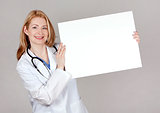 doctor with board
