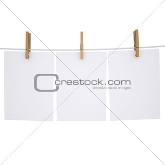 Paper on a rope with clothespins