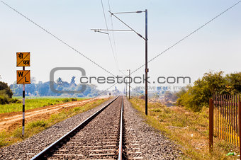 Indian Hinterland landscape with railroad track