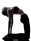 woman exercising yoga camel pose