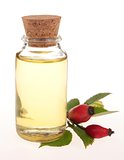 bottle of rose oil - isolated