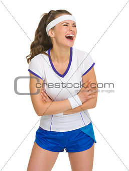 Portrait of laughing female tennis player