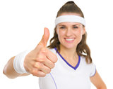 Closeup on smiling female tennis player showing thumbs up