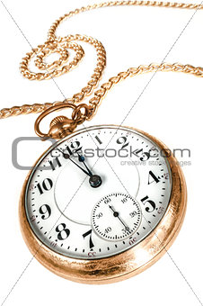 Old pocket watch isolated on white background