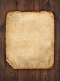 old paper on brown wood texture