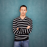 Asian Man In Striped Pullover