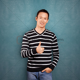 Asian Man In Striped Pullover
