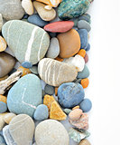 colored stones on white background