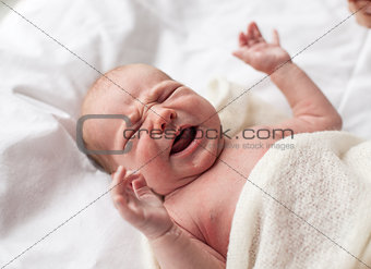 Closeup of newborn baby crying
