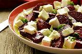 salad of roasted red beets and feta cheese with olive oil