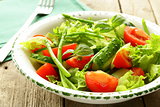 fresh green salad with tomatoes and asparagus