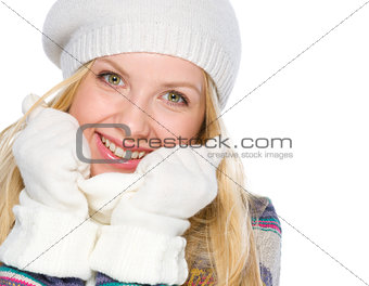Portrait of smiling girl in winter clothes
