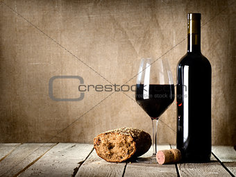 Wine and  bread on the table