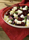 salad of roasted red beets and feta cheese with olive oil