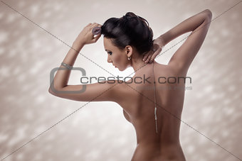 sexy woman showing her nude back