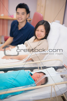 Asian Newborn and parents