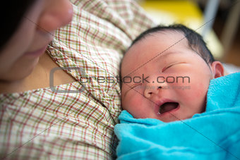 Asian mother and newborn baby