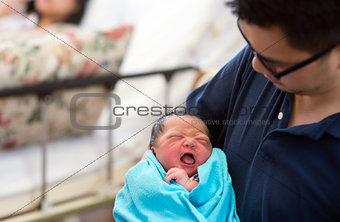 Asian newborn baby and daddy