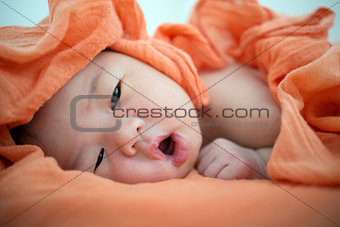 Newborn Asian baby girl awake,