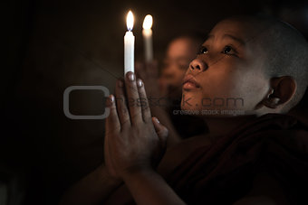 Little monks praying