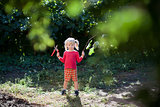 child with secateurs
