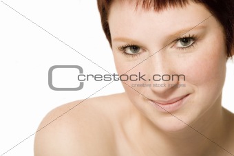 Studio portrait of a flirting young woman with short hair 