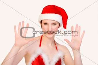 Studio portrait of a Christmas faerie counting 10